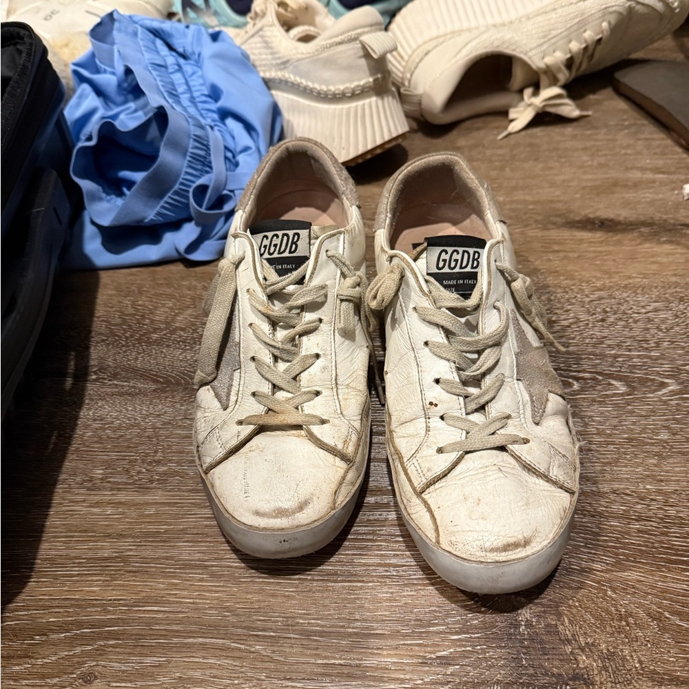 Golden Goose White Sneakers with Distinctive Worn-In Look